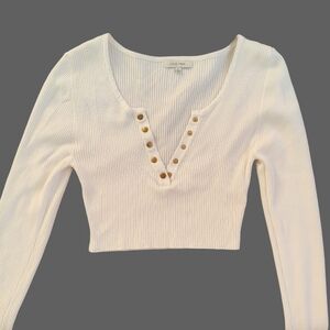 Trendy crop top sweater with button up. Sexy and cute